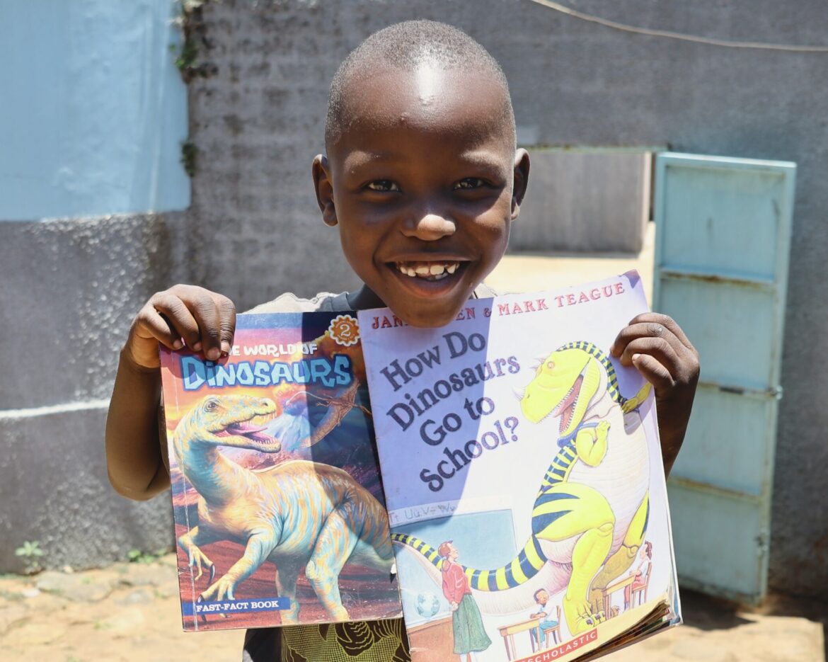 sbvtc-ecdc-student-poses-with-books