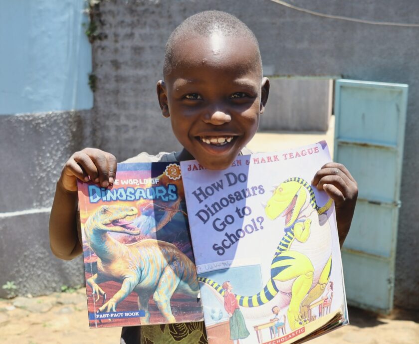 sbvtc-ecdc-student-poses-with-books